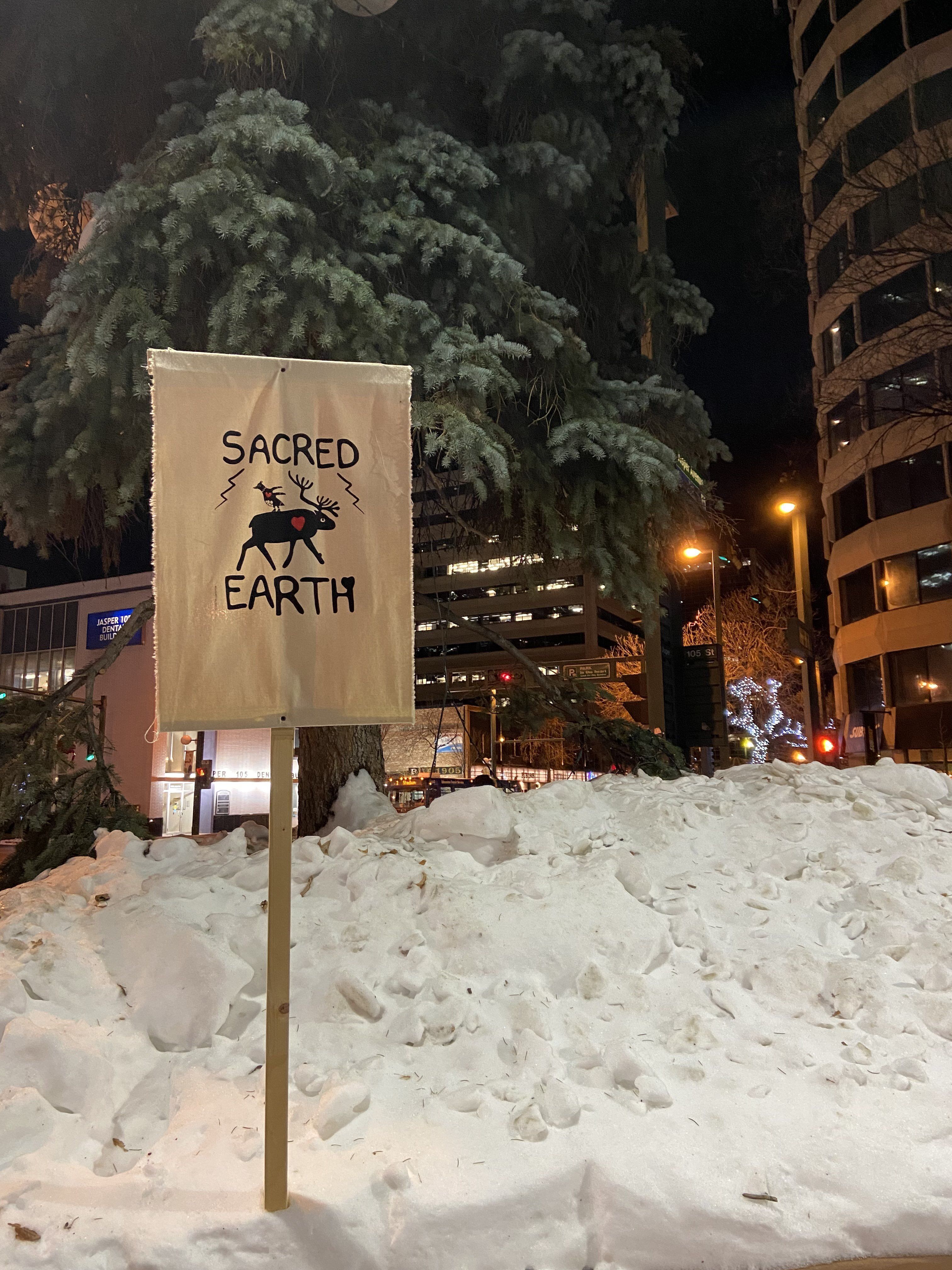 Protest sign in snow.